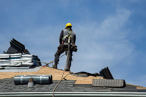 Professional Roof Replacement technician working in Jefferson, MA